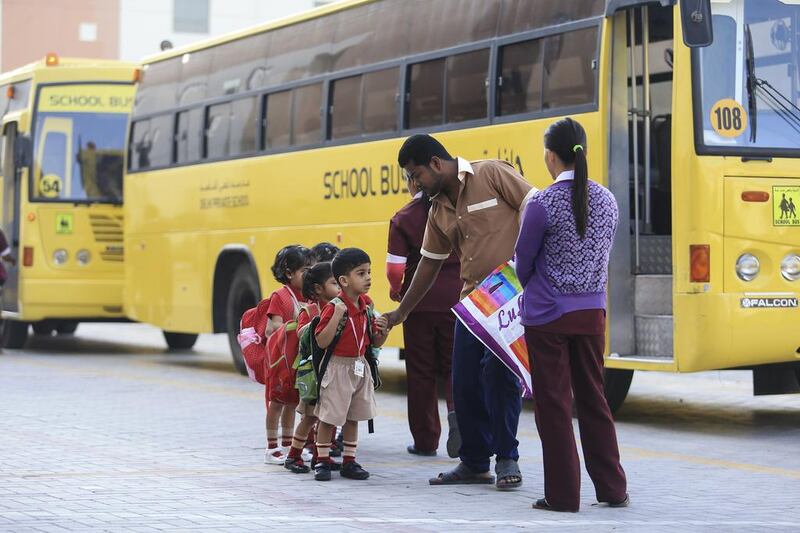 Fresh off the bus, pupils prepare to start their education adventure at the Delhi Private School in Dubai on August 31, 2014. Sarah Dea / The National

