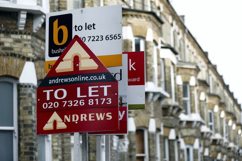 Estate agent signs advertising a rental property "To Let" stand in the Battersea district of London, U.K., on Friday, Nov. 23, 2012. U.K. mortgage approvals rose to a nine-month high in October, the British Bankers' Association said. Photographer: Simon Dawson/Bloomberg