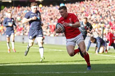 Wales' Josh Adams scores a try in the Six Nations win against Scotland. Reuters