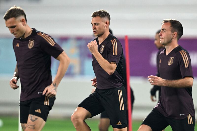 David Raum, Joshua Kimmich and Mario Gotze take part in a training session at Al Shamal Stadium. AFP