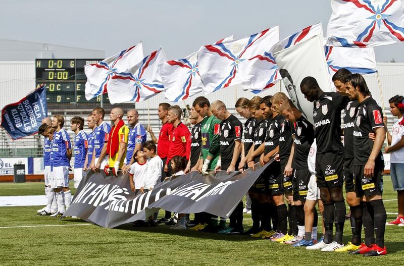 Assyriska Föreningen players honour murdered team mate Eddie Moussa before a match. Niklas Larsson / Scanpix