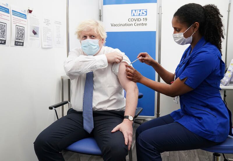 Britain's Prime Minister Boris Johnson receives his booster jab of the coronavirus vaccine at St Thomas Hospital in London, where he was treated for Covid-19 last year. AP