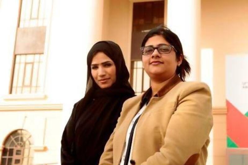 Dr Fauzia Jabeen (right), a researcher at Abu Dhabi University, interviewed 200 undergraduate and postgraduate students about their perceptions of the success of Emiratisation. Some Emirati women like Mariam Al Braiki (left), believe Emiratisation has transformed women's place in society. Jeffrey E Biteng / The National