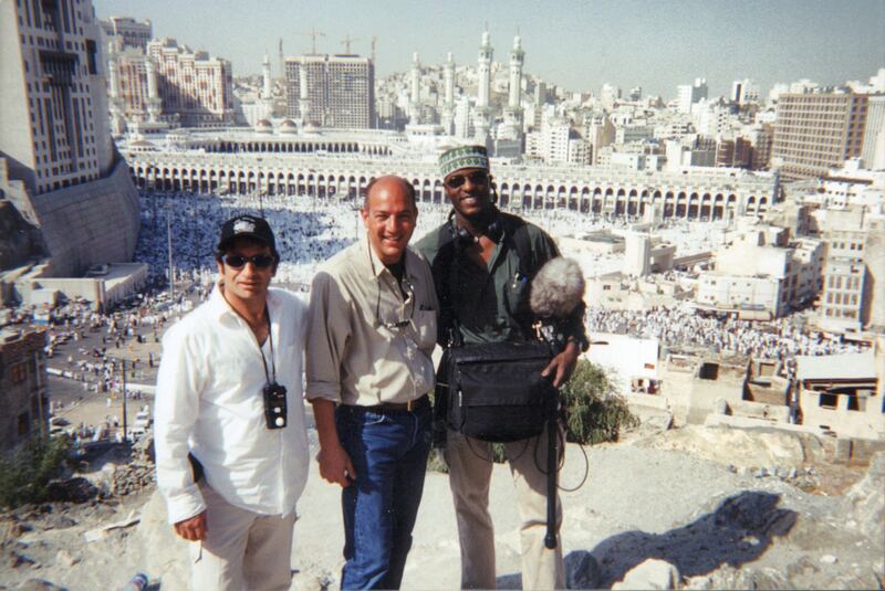 Omar Al Qattan at Mecca with crew members during the filming of 'Muhammad Story of a Prophet' in 2000. Courtesy Omar Al Qattan