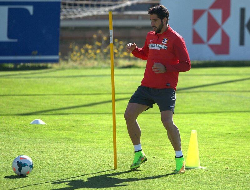 Atletico Madrid midfielder Raul Garcia in action during the team training session for t heir match with Barcelona. Curto de la Torre / AFP / May 16, 2014