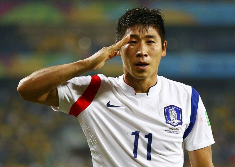 South Korea's Lee Keun-Ho gives a salute after scoring against Russia on Tuesday night in their match at the 2014 World Cup in Cuiaba, Brazil. Paul Hanna / Reuters