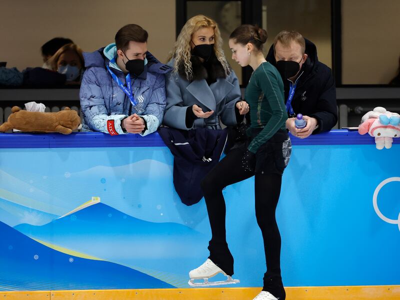 Kamila Valieva speaks to her coach Eteri Tutberidze during a practice session at the Beijing 2022 Olympic Games. EPA