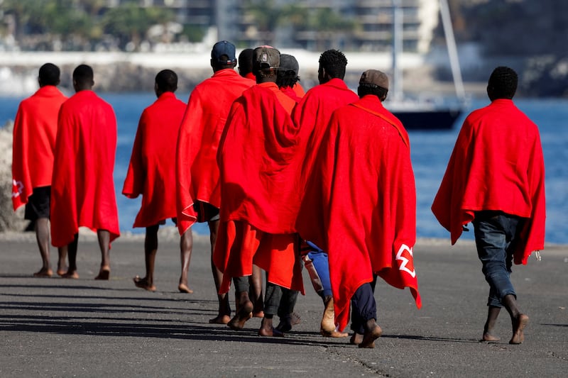 A group of migrants after disembarking from a Spanish coastguard vessel on the island of Gran Canaria, Spain. Reuters