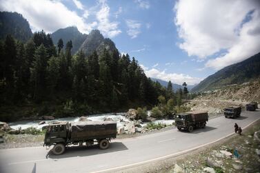 An Indian army convoy travels along the Srinagar-Ladakh highway towards the Ladakh region in September 2020. AP Photo