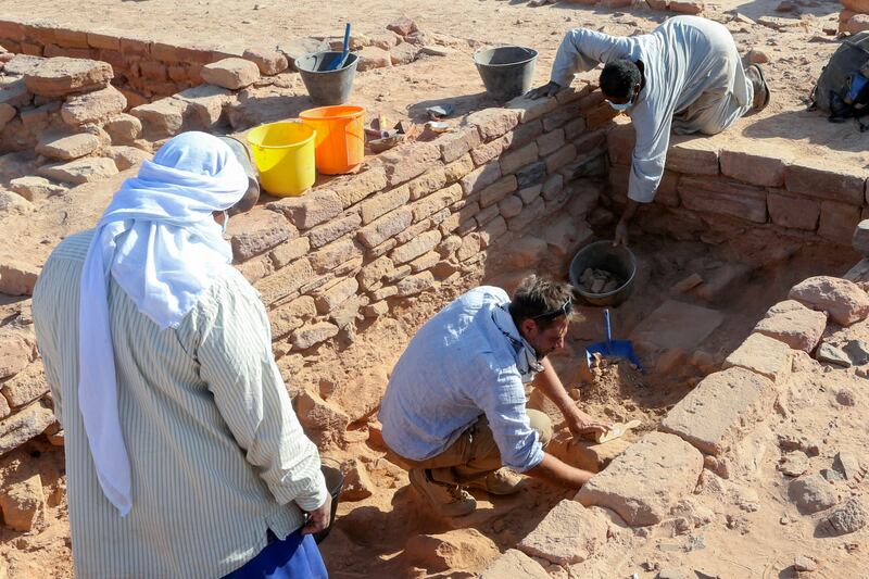 French archaeologists in AlUla, Saudi Arabia, clean pottery to examine findings from the Dadan and Lihyan civilisation dating back to the second half of the first millennium BC. Reuters
