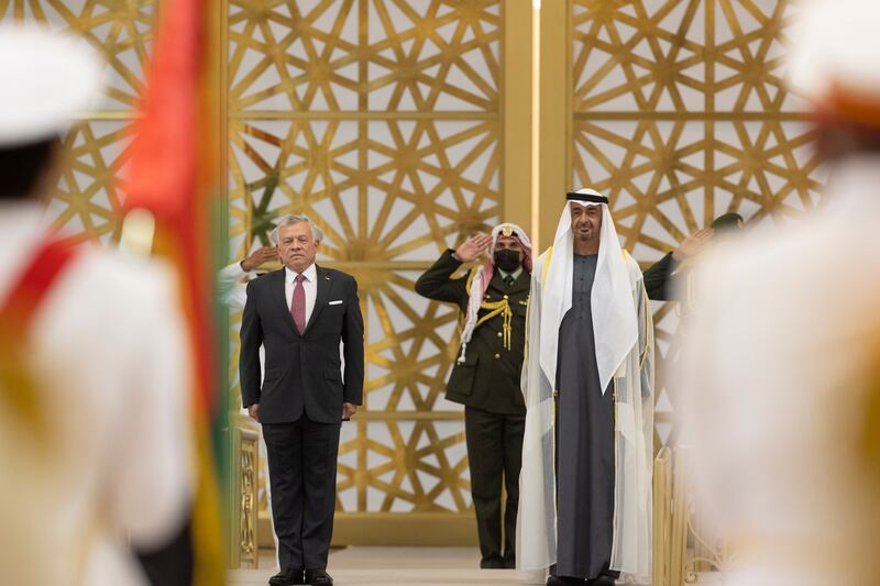 Sheikh Mohamed bin Zayed, Crown Prince of Abu Dhabi and Deputy Supreme Commander of the Armed Forces, and King Abdullah II stand for the national anthem.