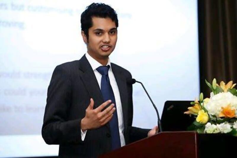 MBA student Neil Gonsalvez, presents his findings at the Pearl Initiative dinner held at the Millenium Hotel. April 23. Dubai, United Arab Emirates. (Photo: Antonie Robertson/The National)