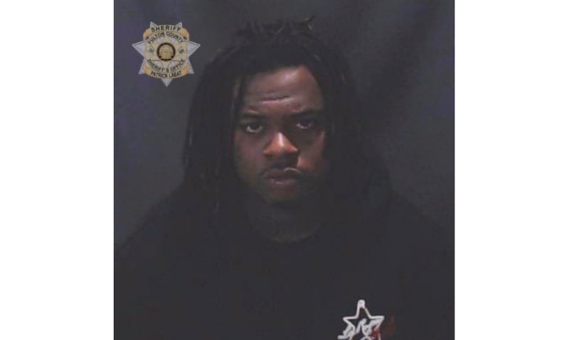 Rapper Gunna was booked into a jail in Atlanta on a racketeering charge after he was indicted with fellow rapper Young Thug and more than two dozen other people. Fulton County Sheriff's Office / AP