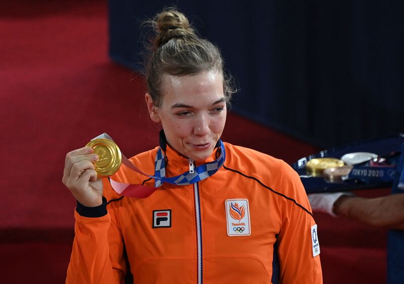 Gold medallist Shanne Braspennincx of Netherlands poses with her medal after the women's track cycling keirin final.