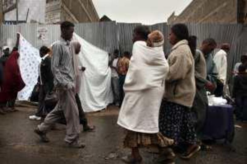 NAIROBI, KENYA - AUGUST 18:  People walk down a market street in Eastleigh, a predominantly Muslim Somali neighborhood on August 18, 2009 in Nairobi, Kenya. Referred to locally as "Little Mogadishu", Eastleigh is home to thousands of Somalis who have fled war-ravaged Somalia in recent years. Over 300,000 refugees have left Somalia and have headed to neighboring Kenya, with most residing in the overcrowded Kenyan camps of Dadaab. Kenyan officials and western security services are becoming increasingly concerned that radical Islamists, specifically members of Al-Shabaab, are also settling in the Eastleigh neighborhood where they could use it as a base to plan future attacks throughout the Horn of Africa. (Photo by Spencer Platt/Getty Images)