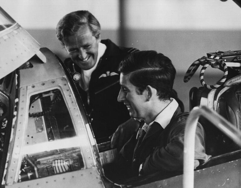 Prince Charles is briefed by Wing Commander 'Hank' Martin before his flight in a Phantom Interceptor as part of his training