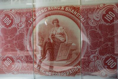 An enlarged mock bank note issued by HSBC outside the bank's headquarters in Hong Kong, China, but for how much longer can it straddle East and West? EPA