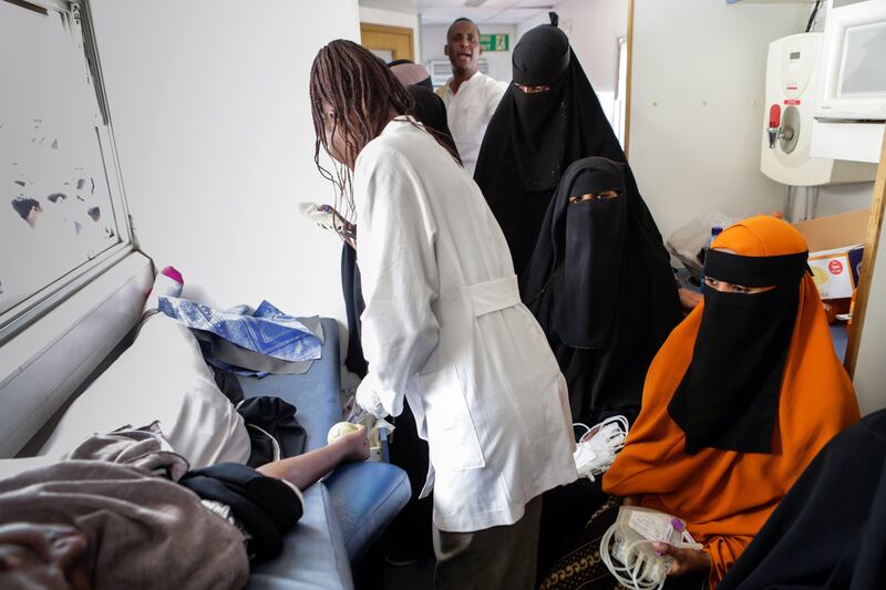 epa06271101 Somali women (R) look on holding blood bags as they wait to give blood inside a blood donation truck during a blood donation event for the victims of the Mogadishu attack in the Somali neighbourhood Eastleigh in the Kenyan capital Nairobi, Kenya, 17 October 2017. The death toll from the 14 October truck bomb attack in Mogadishu has risen to more than 300, one of the world's worst attacks in the recent history. Kenya's Foreign Minister Amina Mohamed sayd the country will evacuate 31 victims of the attack to Nairobi and the country will send 31 tonnes of medicines to Somalia.  EPA/DANIEL IRUNGU