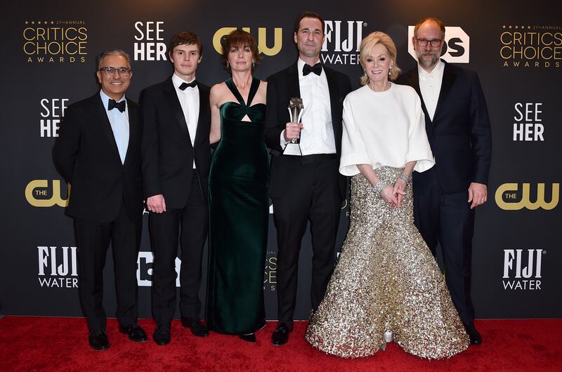 From left, Mark Roybal, Evan Peters, Julianne Nicholson, Brad Ingelsby, Jean Smart and Craig Zobel with the award for Best Limited Series for 'Mare of Easttown'. AP