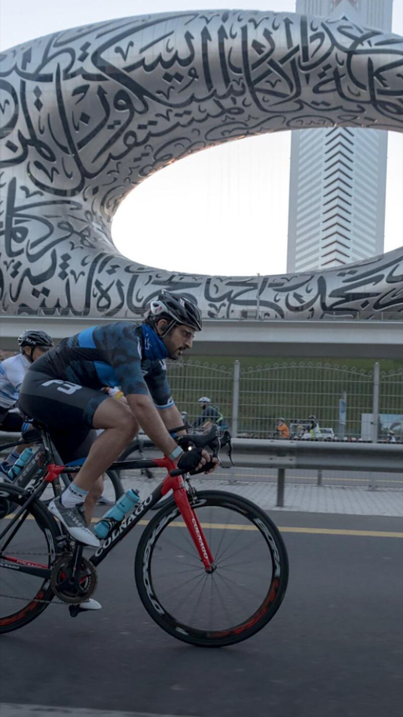 The Dubai Ride challenge took cyclists past major Dubai landmarks, such as the Museum of the Future, which Sheikh Hamdan passes here.