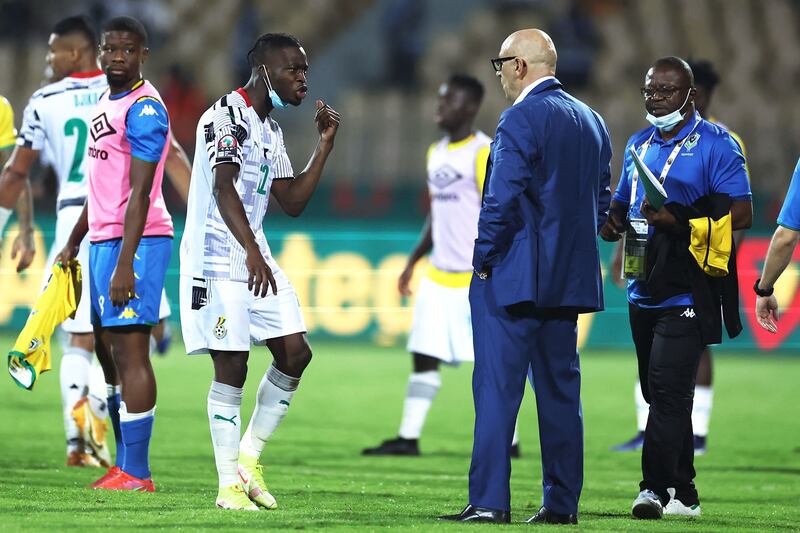 Ghana's forward Kamaldeen Sulemana remonstrates with Gabon's coach Patrice Neveu at Stade Ahmadou Ahidjo in Yaounde. AFP