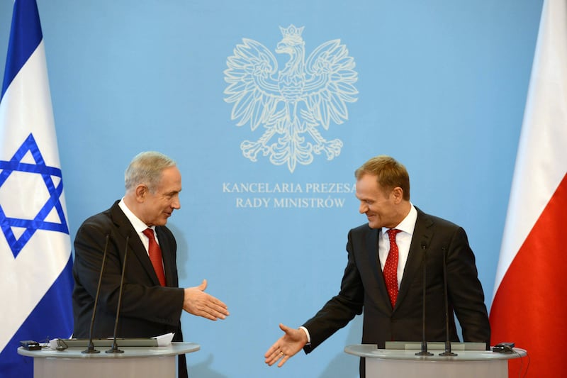 Israeli Prime Minister Benjamin Netanyahu meets Mr Tusk during his first stint as Polish PM in 2013 in Warsaw. Getty Images