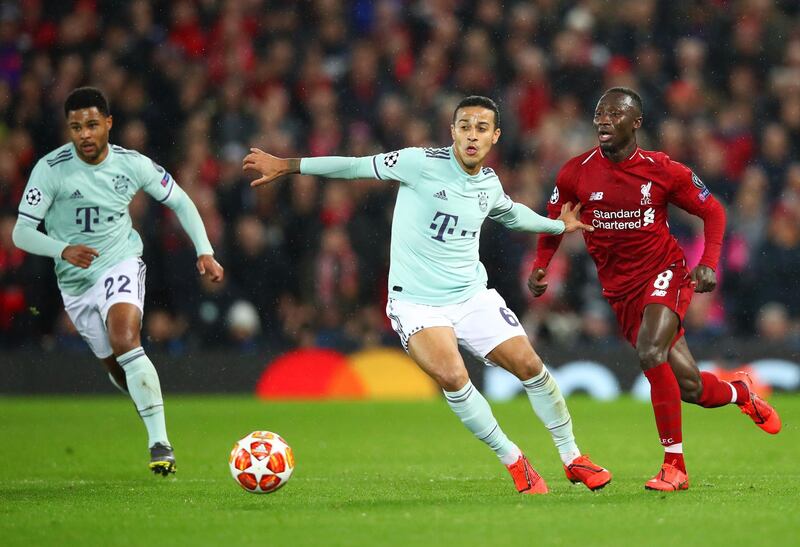 LIVERPOOL, ENGLAND - FEBRUARY 19:  Thiago Alcantara of Bayern Munich holds off Naby Keita of Liverpool during the UEFA Champions League Round of 16 First Leg match between Liverpool and FC Bayern Muenchen at Anfield on February 19, 2019 in Liverpool, England. (Photo by Clive Brunskill/Getty Images)