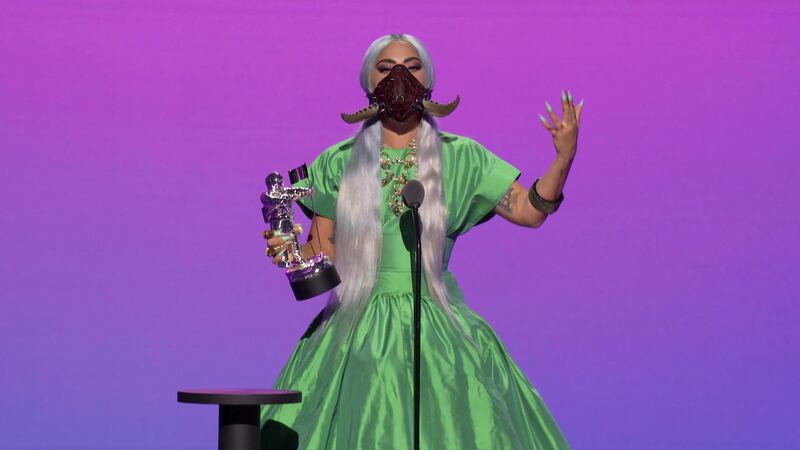 Lady Gaga accepts the award for Artist of the Year during the 2020 MTV VMAs in this screen grab image made available on August 30, 2020. VIACOM/Handout via REUTERS ATTENTION EDITORS - THIS IMAGE HAS BEEN SUPPLIED BY A THIRD PARTY. EDITORIAL USE ONLY. NO RESALES. NO ARCHIVES.