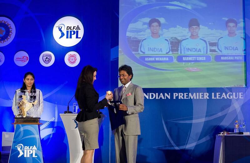 A few years after his removal as league commissioner, Lalit Modi, right, with Preity Zinta, Bollywood actress and co-owner of the Kings XI Punjab during the 2010 auction, claimed members of the Indian board arm-twisted franchises into not selecting Pakistani players. Ritam Banerjee / Getty Images