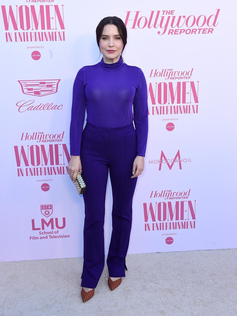 Sophia Bush arrives at The Hollywood Reporter's Women in Entertainment Breakfast Gala wearing Dorothee Schumacher. AP