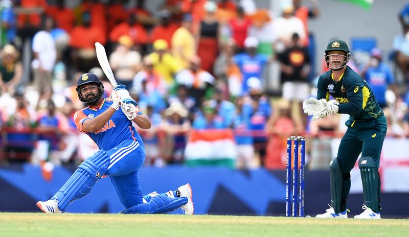 India's Rohit Sharma cracks one of eight sixes in his 41-ball 92 which also included seven fours. India reached 205-5 in their 20 overs. Getty Images