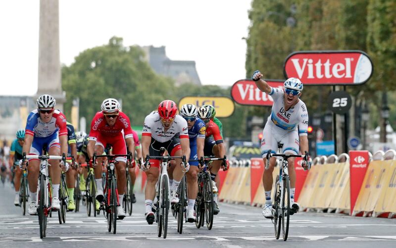 Cycling - Tour de France - The 116-km Stage 21 from Houilles to Paris Champs-Elysees - July 29, 2018 - UAE Team Emirates rider Alexander Kristoff of Norway wins the stage ahead of Trek-Segafredo rider John Degenkolb of Germany and Groupama-FDJ rider Arnaud Demare of France. REUTERS/Benoit Tessier