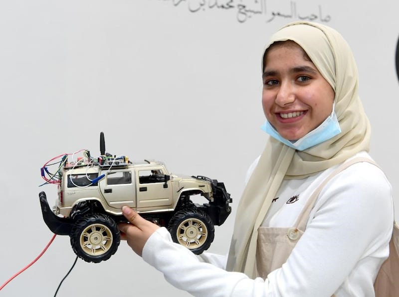 Mariam with one of her many inventions designed to boost safety and improve lives. Photo: Mariam Alghafri