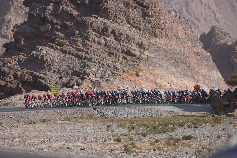 The peloton heads towards Jebel Jais. AFP