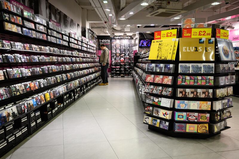 A man browses CDs inside the original branch of the HMV chain of music retailers in London, England. Getty Images