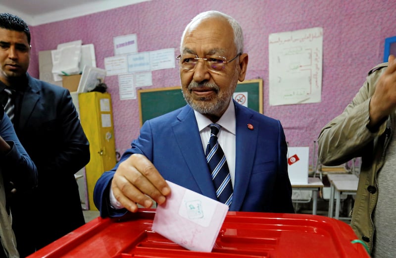 FILE PHOTO: Rached Ghannouchi, head of the Ennahda party, casts his vote at a polling station for the municipal election in Tunis, Tunisia, May 6, 2018. REUTERS/Zoubeir Souissi/File Photo
