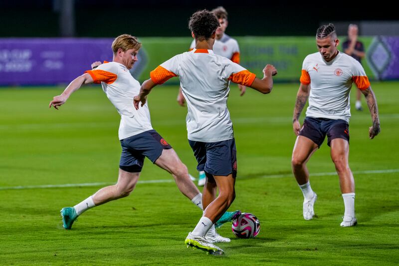 Manchester City's Kevin de Bruyne, left, trains with teammates at the King Abdullah Sports City Stadium in Jeddah on Thursday, December 21, 2023. AP