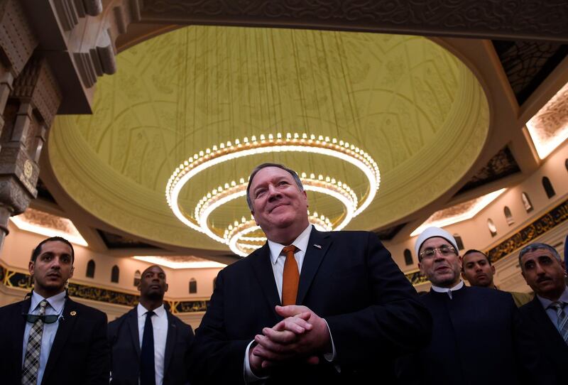 US Secretary of State Mike Pompeo (C) speaks to the press during a tour of the newly-inaugrated Al-Fattah Al-Alim mosque in Egypt's New Administrative Capital, 45 kilometres (28 miles) east of Cairo on January 10, 2019. The top US diplomat is in Egypt on the latest leg of a whistle-stop regional tour aimed at shoring up Washington's Middle East policy following President Donald Trump's shock decision to withdraw 2,000 US troops from Syria. / AFP / POOL / ANDREW CABALLERO-REYNOLDS
