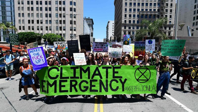 Climate change activists, both young and old, take part in the international Strike for Climate protest in Los Angeles. AFP