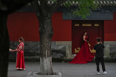 Chinese brides-to-be wearing red in Beijing. AP Photo