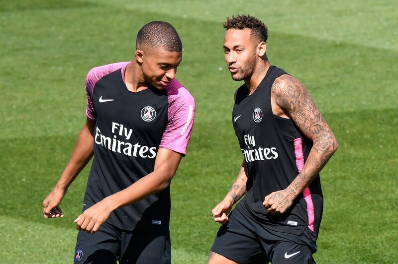French forward Kylian Mbappe, left, and Brazilian forward Neymar take part in a training session in Saint-Germain-en-Laye. AFP