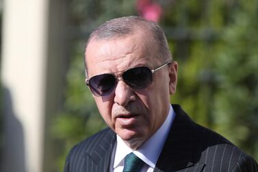 Turkey's President Recep Tayyip Erdogan speaks to the media after Friday prayers in Istanbul on October 23, 2020. Turkish Presidency via AP