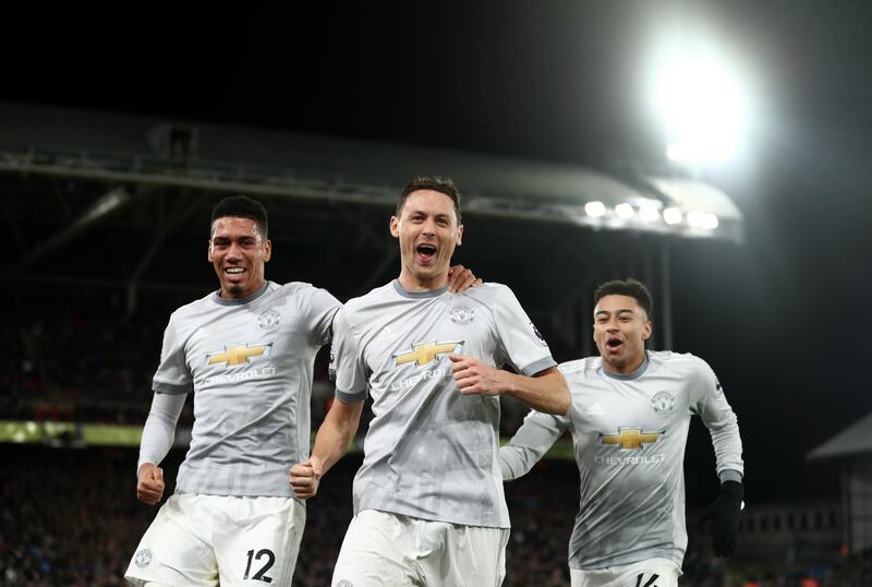 LONDON, ENGLAND - MARCH 05: Chris Smalling, Nemanja Matic and Jesse Lingard of Manchester United celebrate during the Premier League match between Crystal Palace and Manchester United at Selhurst Park on March 5, 2018 in London, England. (Photo by Catherine Ivill/Getty Images)
