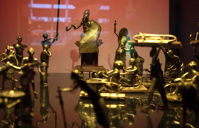 The Ato ceremony of the Kingdom of Dahomey, circa 1934, is pictured, on June 18, 2018 at the Quai Branly Museum-Jacques Chirac in Paris. Benin is demanding restitution of its national treasures that had been taken from the former French colony Dahomey (current Benin) to France and currently are on display at Quai Branly, a museum featuring the indigenous art and cultures of Africa. / AFP / GERARD JULIEN
