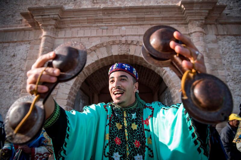 A Gnawa traditional group performs in the city of Essaouira, Morocco, to celebrate the decision to add the Gnawa culture to UNESCO's list of Intangible Cultural Heritage of Humanity. AFP