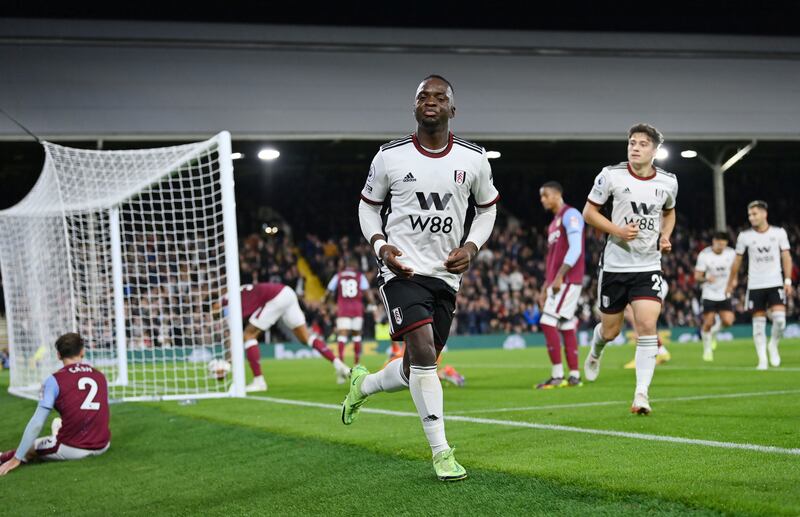 Neeskens Kebano of Fulham celebrates after Tyrone Mings of Aston Villa scored an own goal to make it 3-0 to the home side. Getty Images