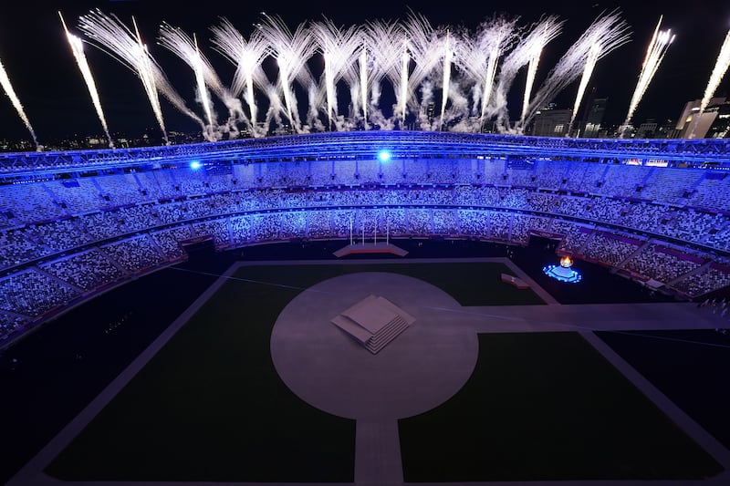 Fireworks go off during the Tokyo Olympics closing ceremony on Sunday, August 8.