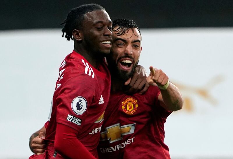 Bruno Fernandes celebrates with Aaron Wan-Bissaka after scoring the second goal late on. EPA