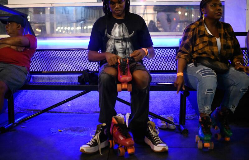 A man gets ready to skate during a listening party for Beyonce's new album 'Cowboy Carter' at Discovery Green’s outdoor roller skating rink in Houston, Texas. AFP