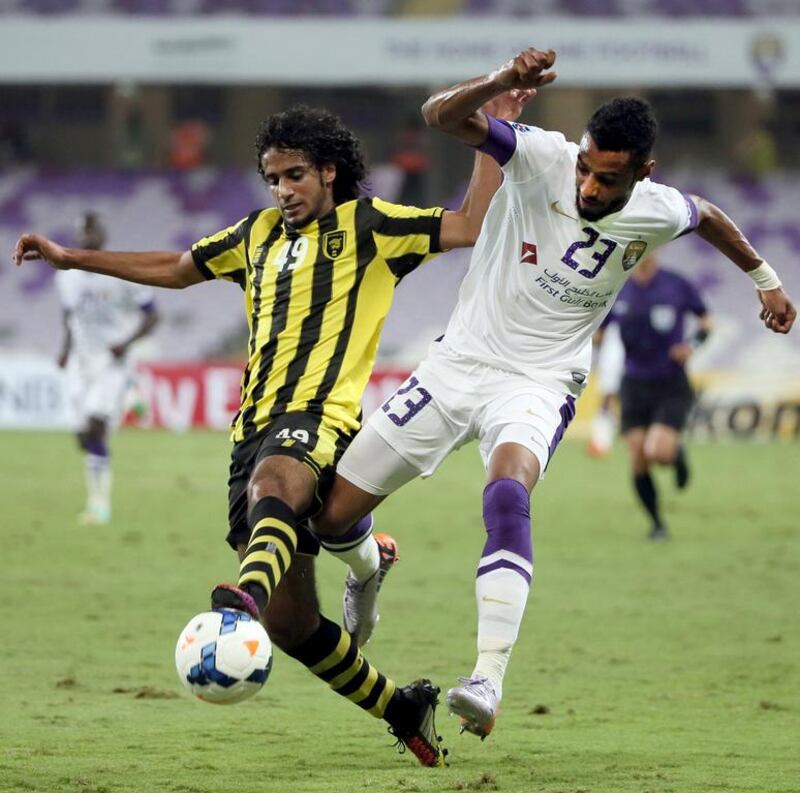 Mohamed Ahmad Gharib, right, and his Al Ain side will visit the capital on Tuesday night for an Asian Champions League match. Karim Sahib / AFP

